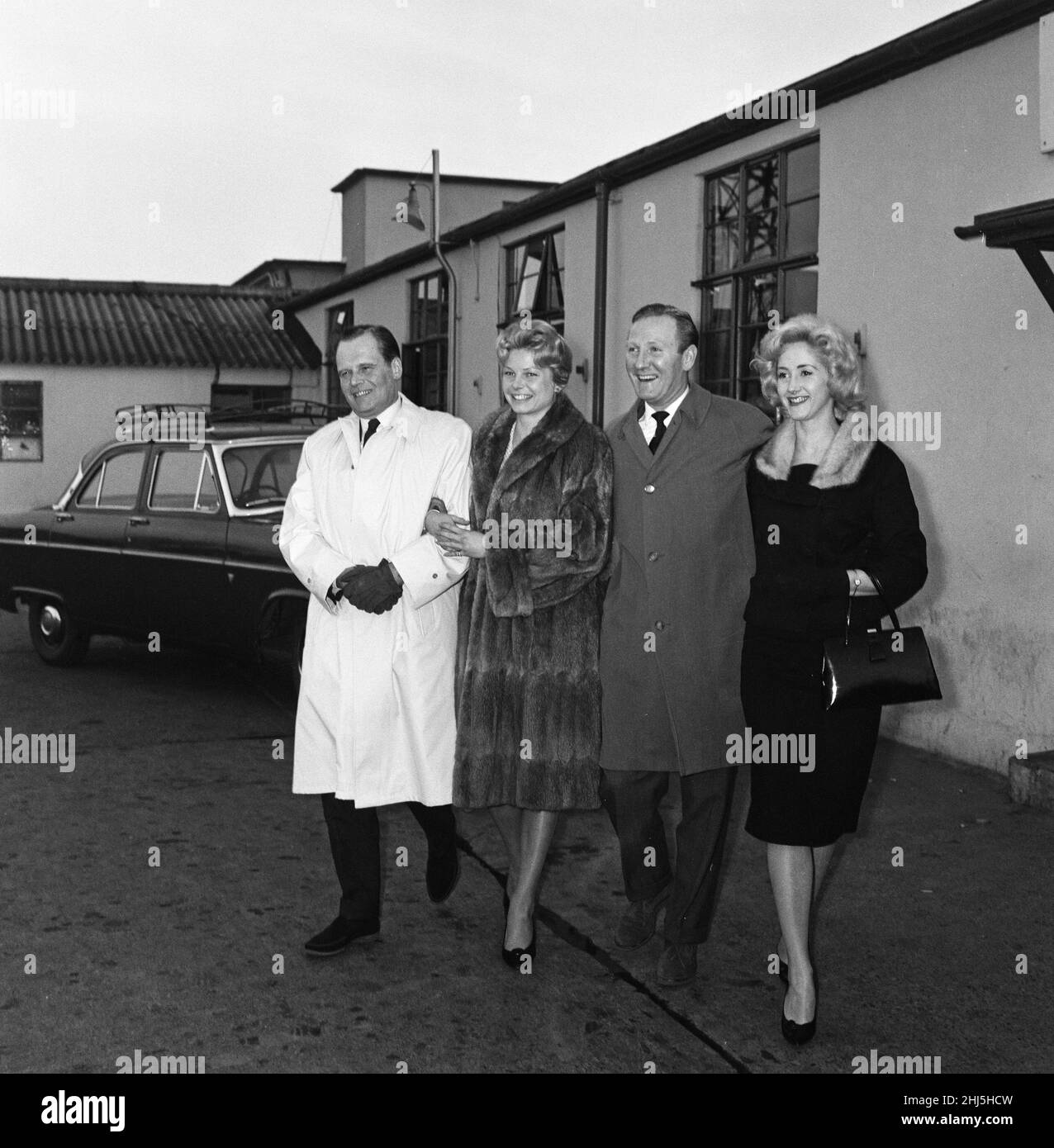 The British delegation to the Punta del Este International Film Festival at which the official British entry is 'Conspiracy of Hearts', left London Airport for Uruguay. L-R Albert Lieven, Mary Peach, Leslie Phillips and Liz Fraser.  19th January 1961. Stock Photo