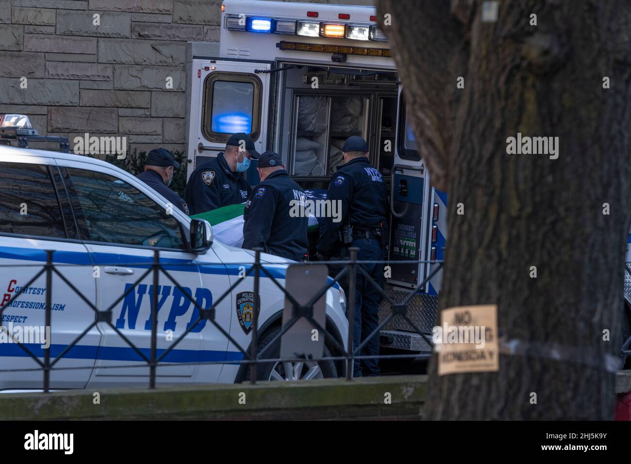 New York, NY January 26, 2022 Police officers carry the casket of of
