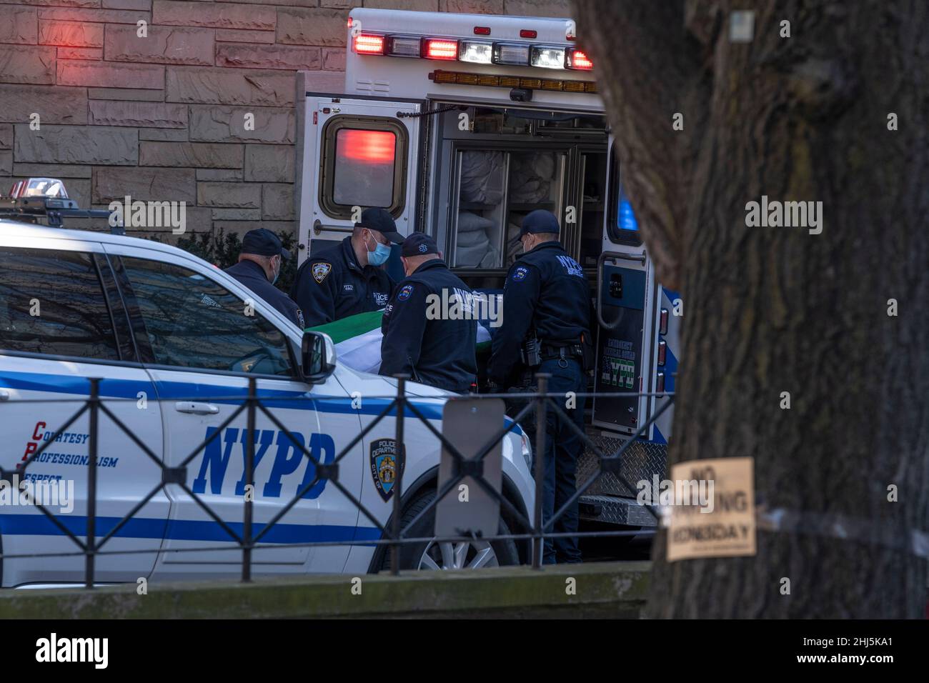 New York, NY January 26, 2022 Police officers carry the casket of of