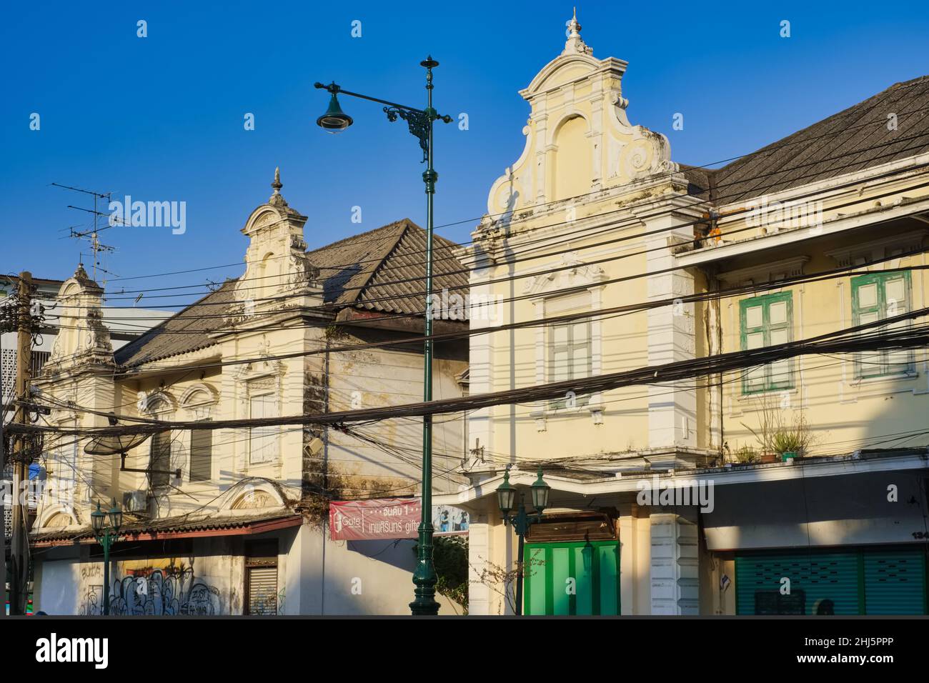 Picturesque old houses along Atsadang Road, in Phra Nakhon or Rattanakosin Island, Bangkok, Thailand, in a style often described as Sino-Portuguese. Stock Photo