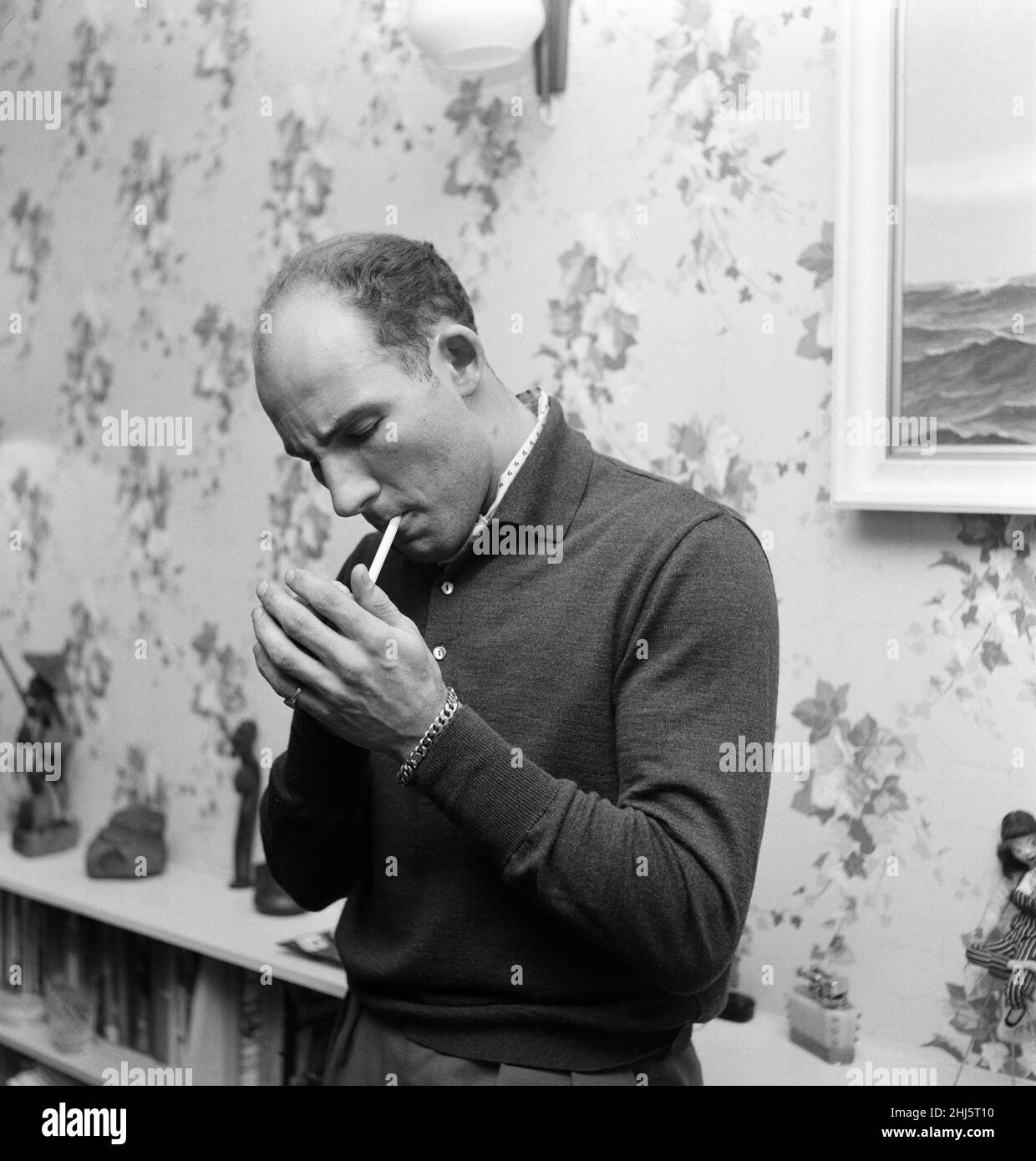 Racing driver Stirling Moss at his home in Mayfair. 13th March 1960. Stock Photo