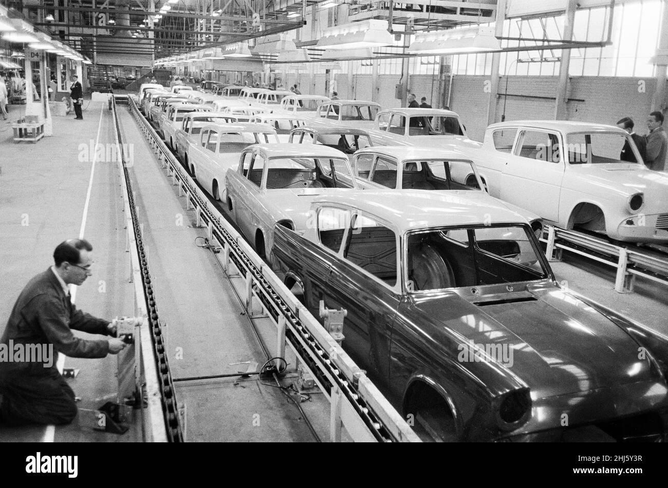 New Ford Anglia cars coming off the production line at the new Ford paint, trim and assembly plant in Dagenham, Essex.27th October 1959. Stock Photo