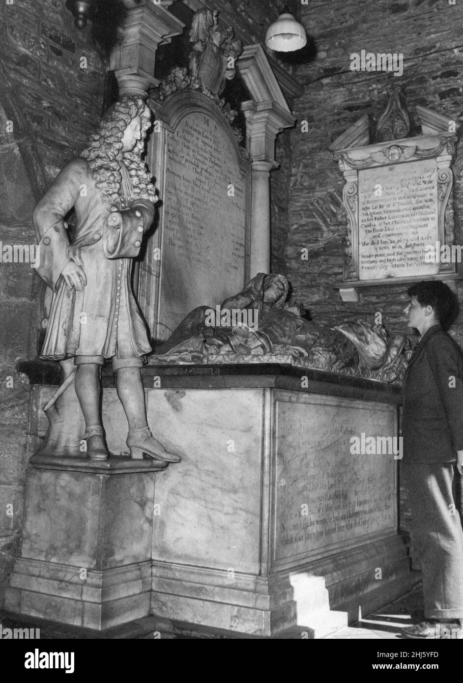 Christ College in Brecon, a market town and community in Powys, Mid Wales, 20th June 1957. School boy admires statue in the school chapel. Stock Photo