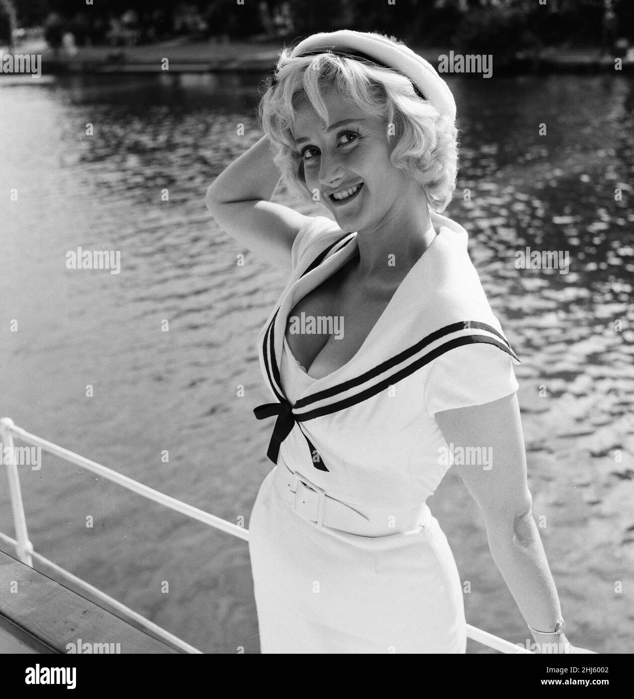 Liz Fraser, English actress, pictured on location at Tagg's Island, in the London Borough of Richmond upon Thames, where she is currently filming Double Bunk, Monday 26th September 1960. Stock Photo