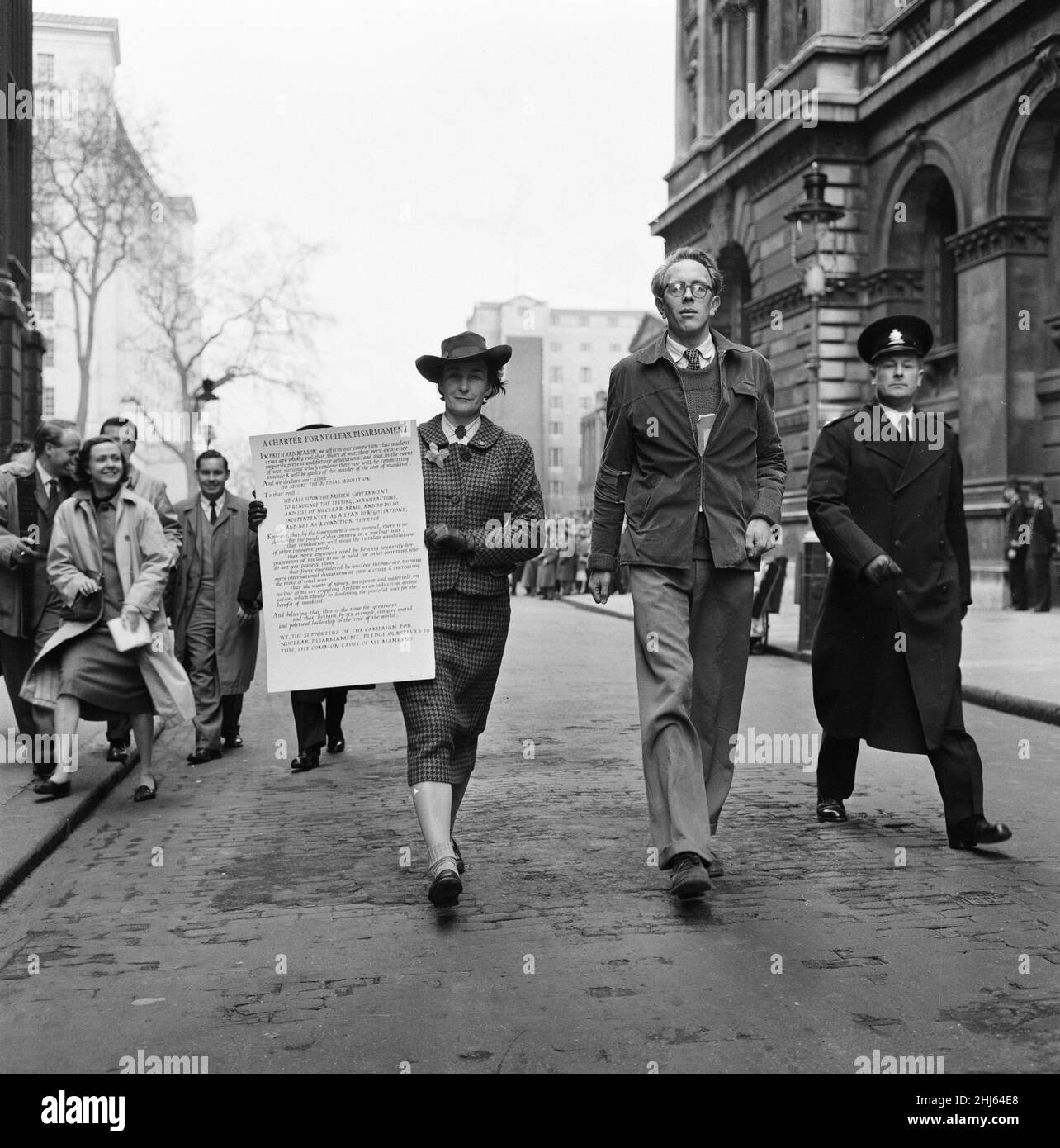 Ban The Bomb movement four day march from the Atomic Weapons Research Establishment at Aldermaston, Berkshire, to Trafalgar Square, London, Monday 30th March 1959. Our Picture Shows ... Jacquetta Hawkes, archaeologist and writer, heads to Downing Street, to deliver an Anti H Bomb Charter to the Prime Minister.   The second annual Easter march was organised by the Campaign for Nuclear Disarmament.  Tens of thousands of people marked the end of the Aldermaston march with a rally in central London. This was the largest demonstration London had seen in the 20th Century. Stock Photo