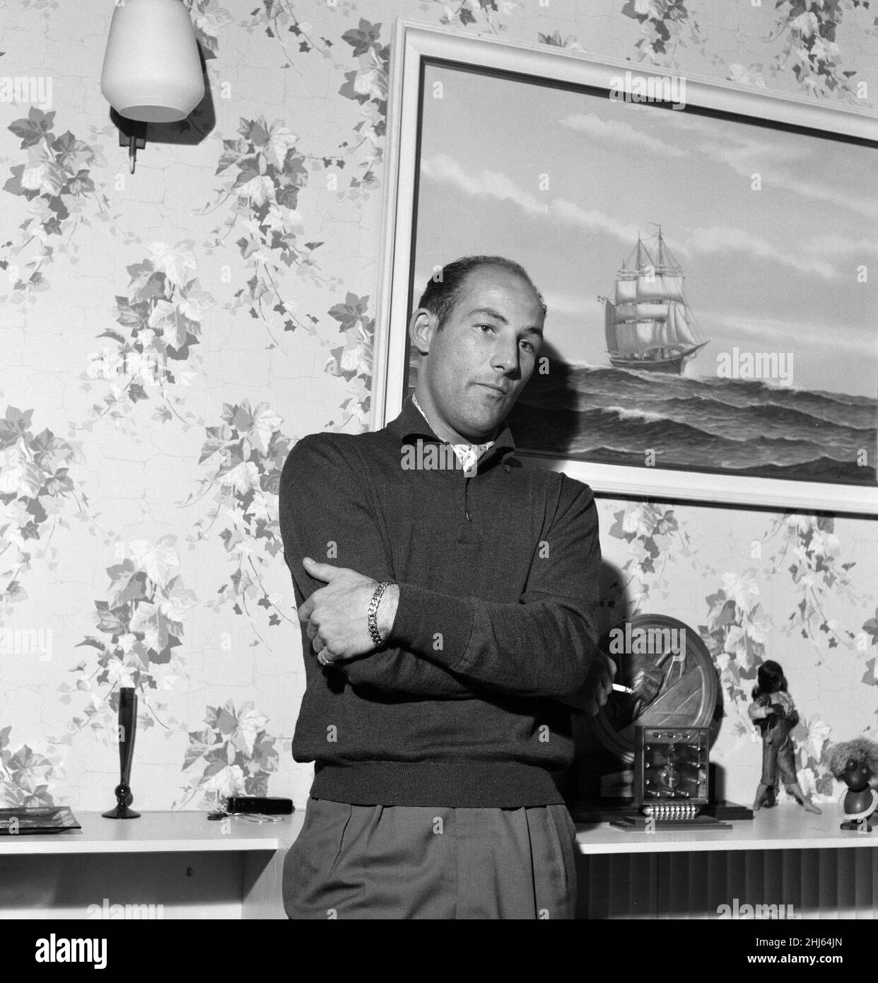 Racing driver Stirling Moss at his home in Mayfair. 13th March 1960. Stock Photo