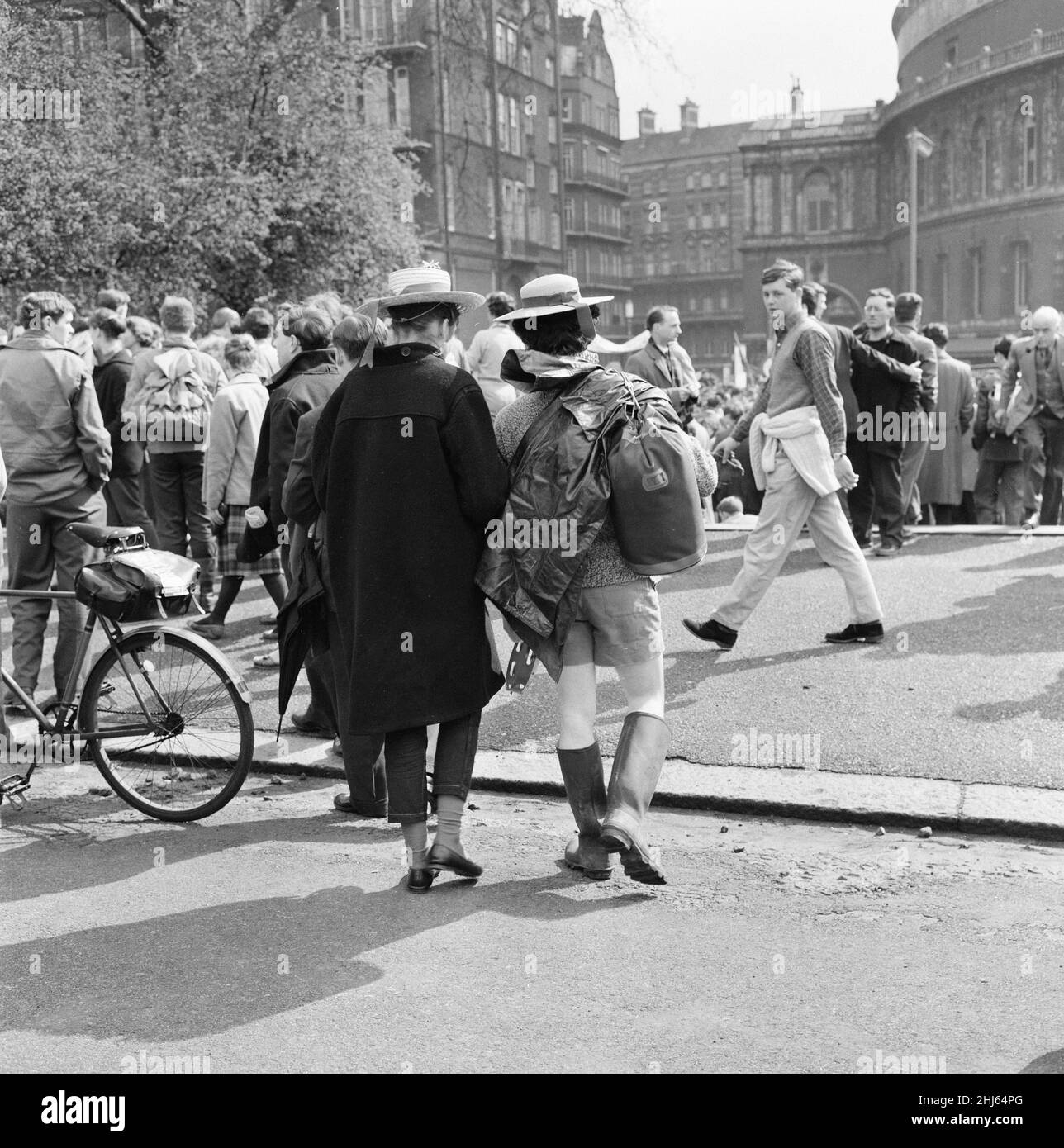 Ban The Bomb movement four day march from the Atomic Weapons Research Establishment at Aldermaston, Berkshire, to Trafalgar Square, London, Monday 30th March 1959. Our Picture Shows ... marchers after leaving Hyde Park as they head towards Trafalgar Square, passing Royal Albert Hall on their right.   The second annual Easter march was organised by the Campaign for Nuclear Disarmament.  Tens of thousands of people marked the end of the Aldermaston march with a rally in central London. This was the largest demonstration London had seen in the 20th Century. Stock Photo