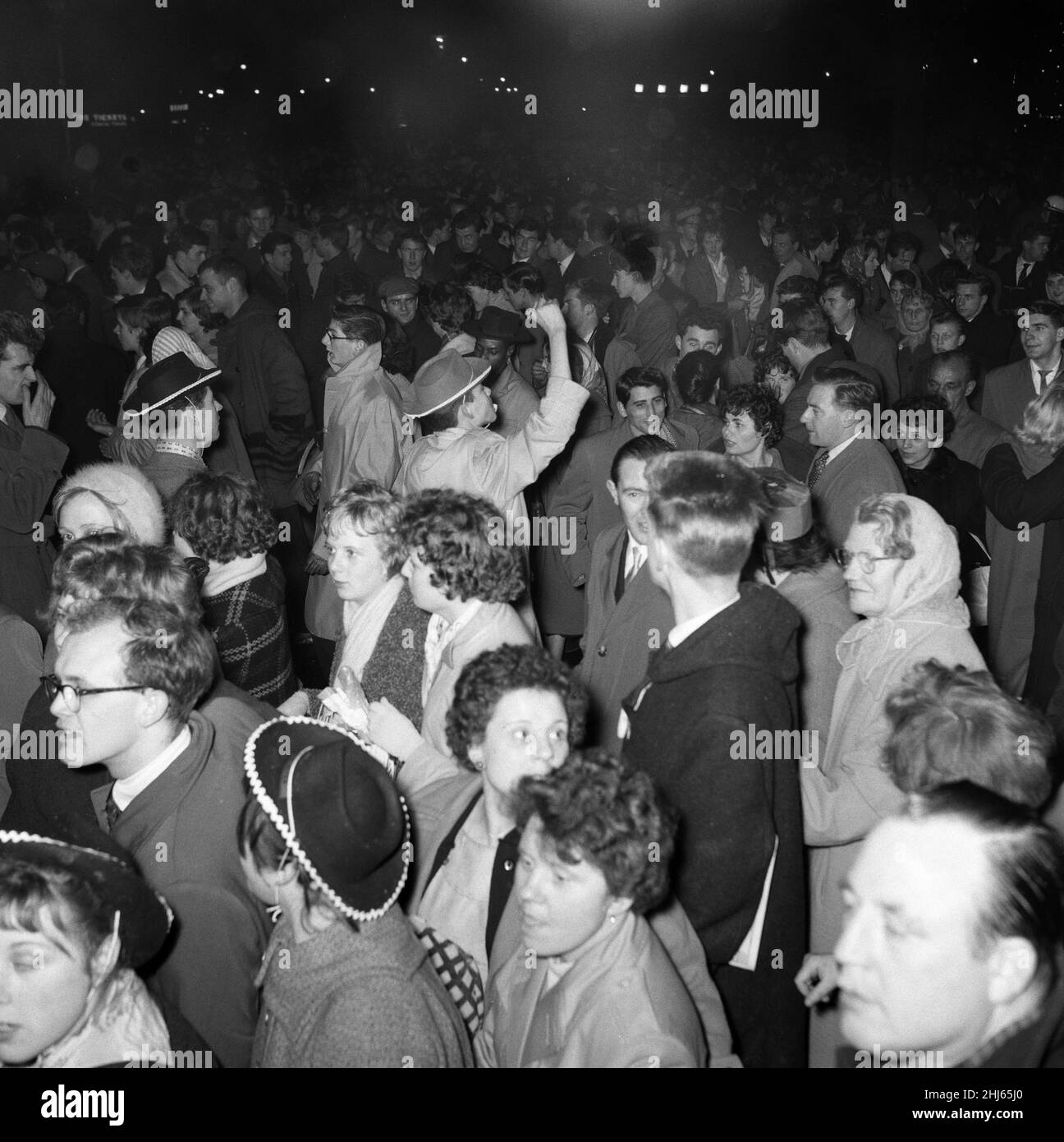 Scenes in Trafalgar Square Fountain as the New Year comes in. Thousands congregated on the square for the occasion. 1st January 1960. Stock Photo