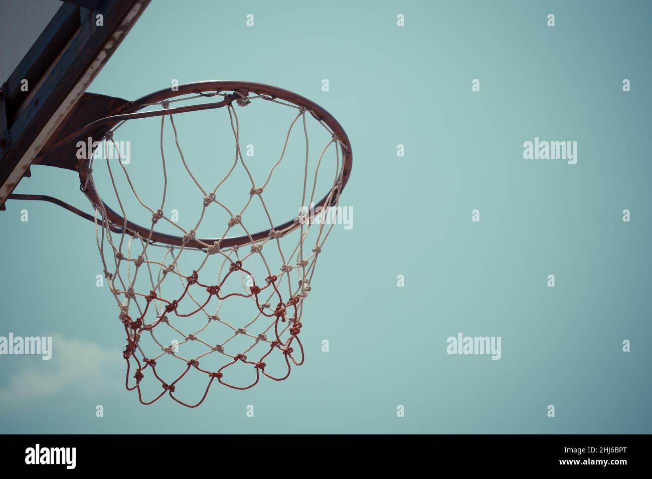 Download “A Perfectly Executed Red Ring Basketball Shot!” Wallpaper