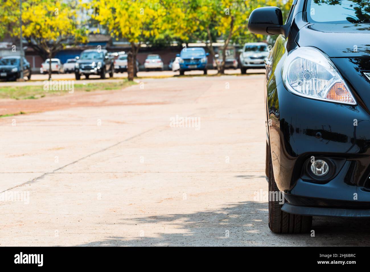 Half front view of black car park on the car park background Stock Photo Alamy