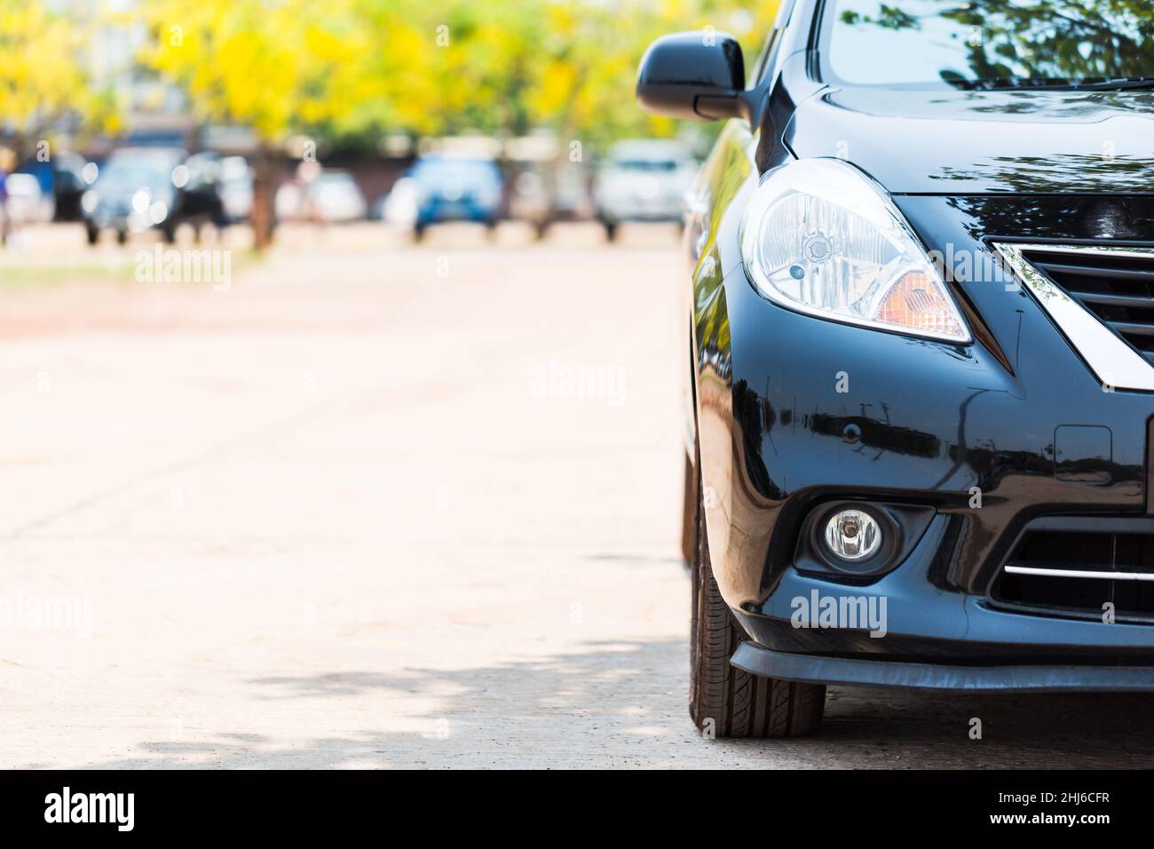 Half front view of black car park on the car park background Stock Photo Alamy