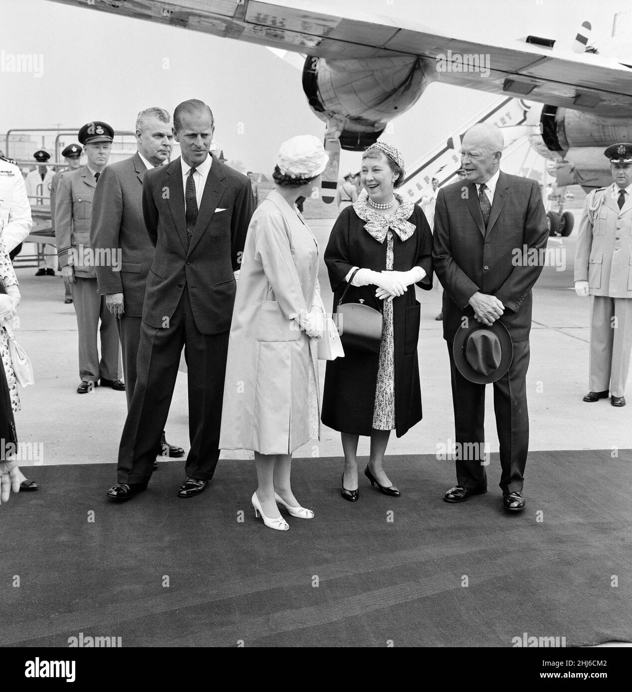 Queen Elizabeth II and The Duke of Edinburgh welcome President Eisenhower and his wife when they arrived by air from Washington at the Royal Canadian Air Force base at St Hubert, near Montreal. 26th June 1959. Stock Photo