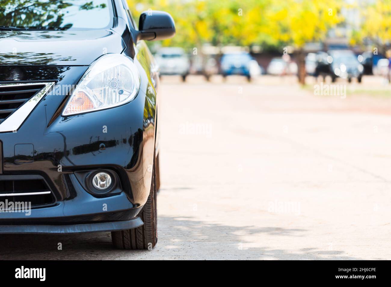 Half front view of black car park on the car park background Stock Photo Alamy