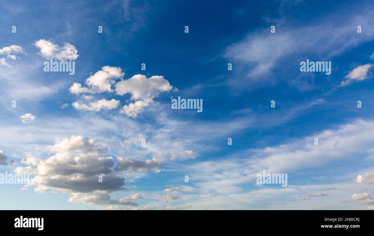 blue sky background with white fluffy clouds on sunny day Stock Photo ...