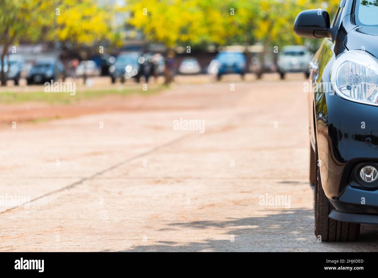 Half front view of black car park on the car park background Stock Photo Alamy
