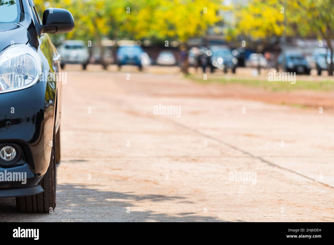 Half front view of black car park on the car park background Stock Photo Alamy