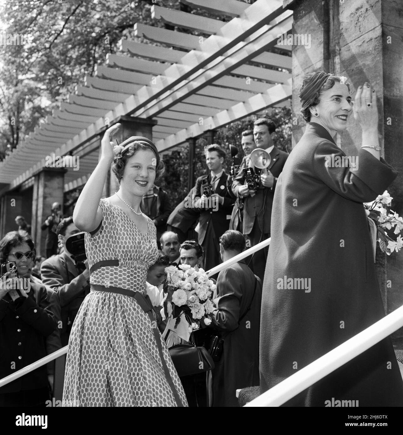 Queen Ingrid (right) and Princess Margrethe photographed during their tour of the Carlsberg Breweries. The Danish royal family are hosting the Queen Elizabeth II and Prince Philip, Duke of Edinburgh visit to Denmark 22nd May 1957. Stock Photo