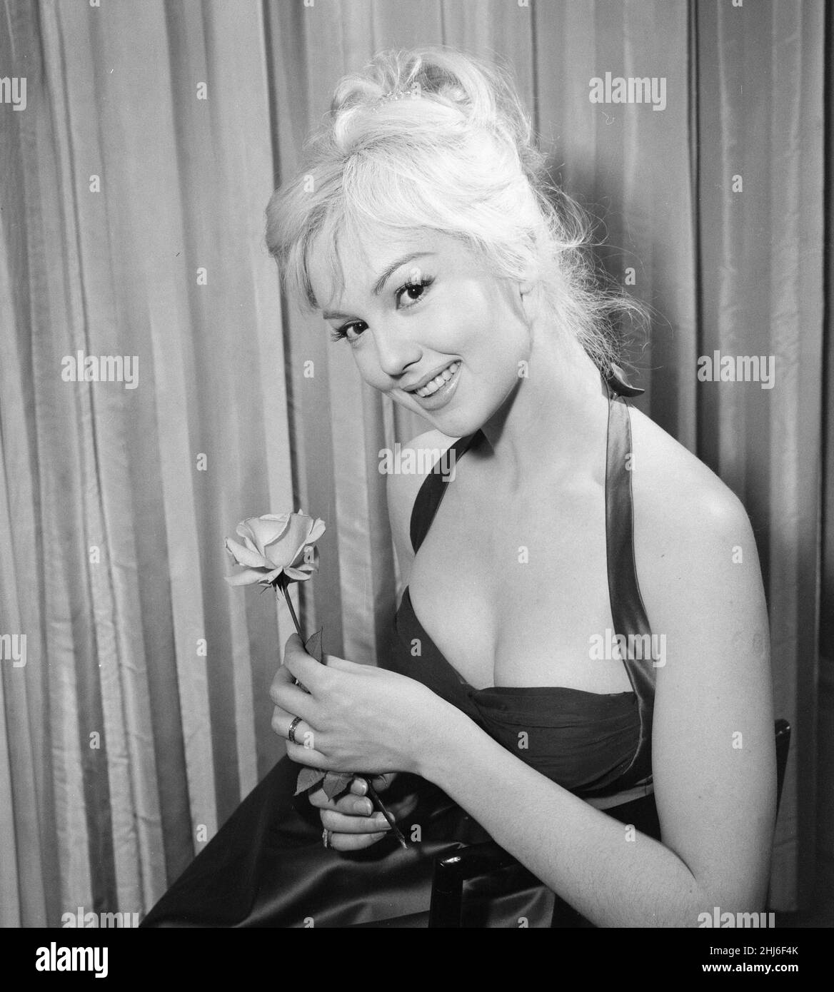 Mylene Demongeot, french actress, pictured in her suite at The Savoy Hotel, London, Friday 12th December 1958. Mylene is in the UK for the premiere of her new film Be Beautiful But Shut Up, also know as Blonde for Danger, in which she plays the role of Virginie Dumayet. Stock Photo