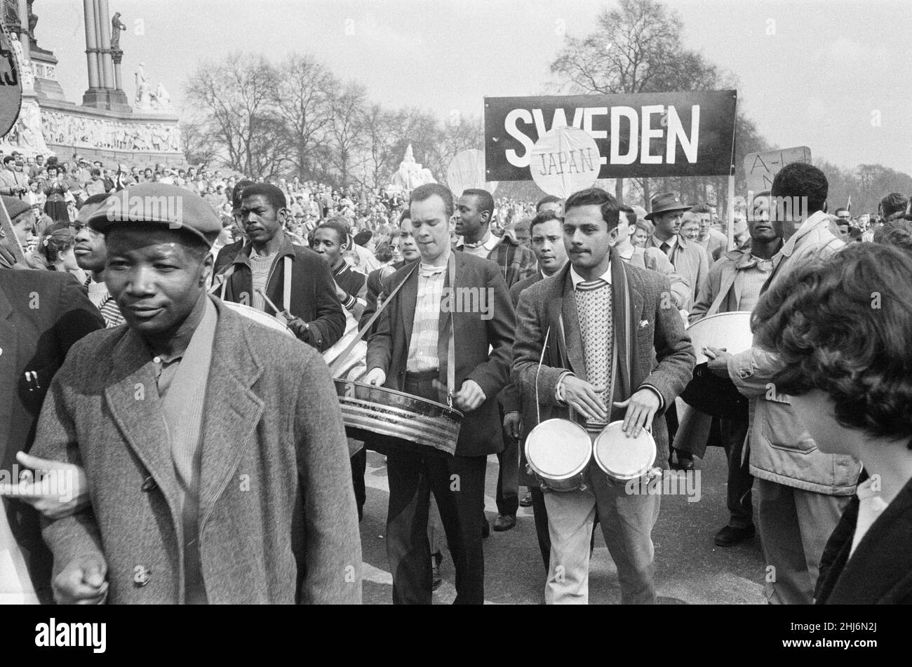 Ban The Bomb movement four day march from the Atomic Weapons Research Establishment at Aldermaston, Berkshire, to Trafalgar Square, London, Monday 30th March 1959. Our Picture Shows ... West Indies, Japanese and Swedish Contingents in the anti-H bomb march.¿The second annual Easter march was organised by the Campaign for Nuclear Disarmament.  Tens of thousands of people marked the end of the Aldermaston march with a rally in central London. This was the largest demonstration London had seen in the 20th Century. Stock Photo