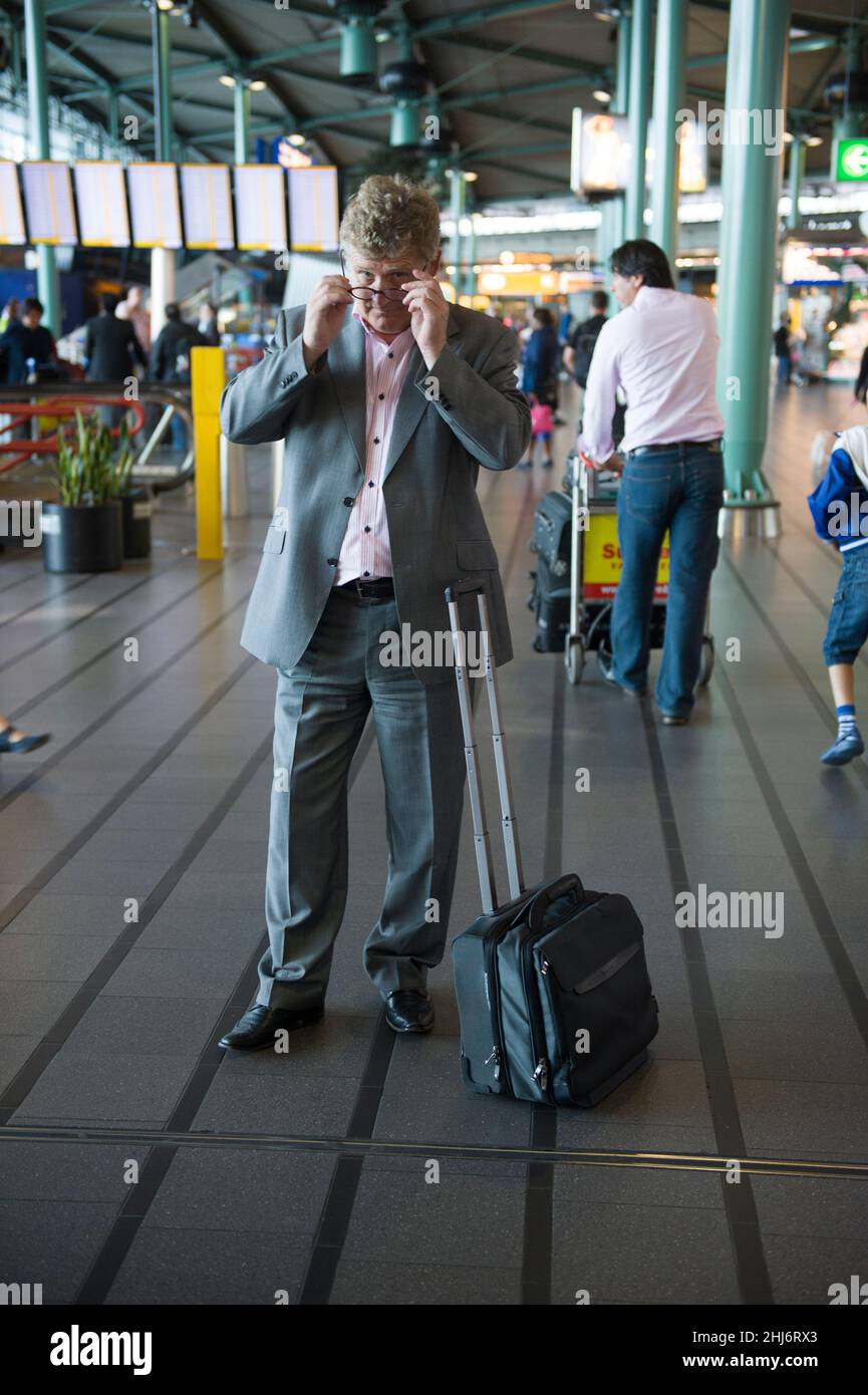 Schiphol Airport, Amsterdam, Netherland. Adult, caucasian man with