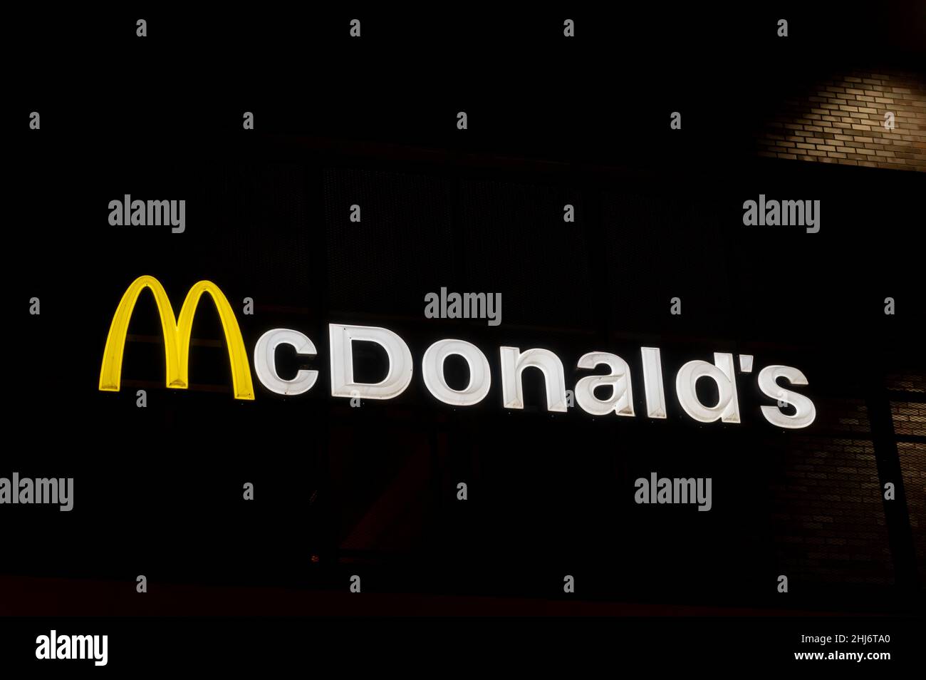 Germany , Halle , 29.10.2021 , Neon lettering of a McDonalds branch at night Stock Photo