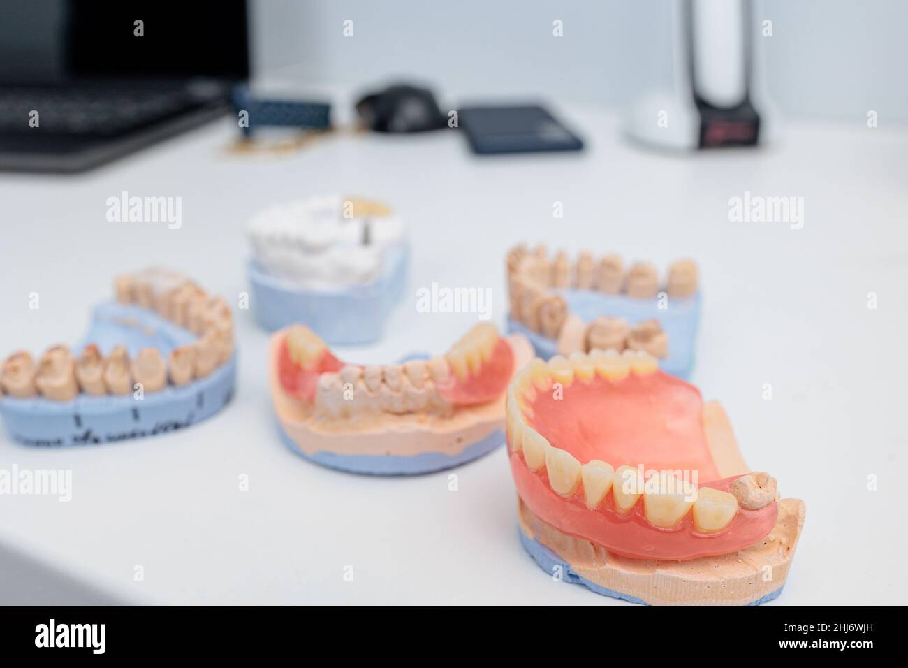 Dentures on a white background. Closeup of dentures. Full removable