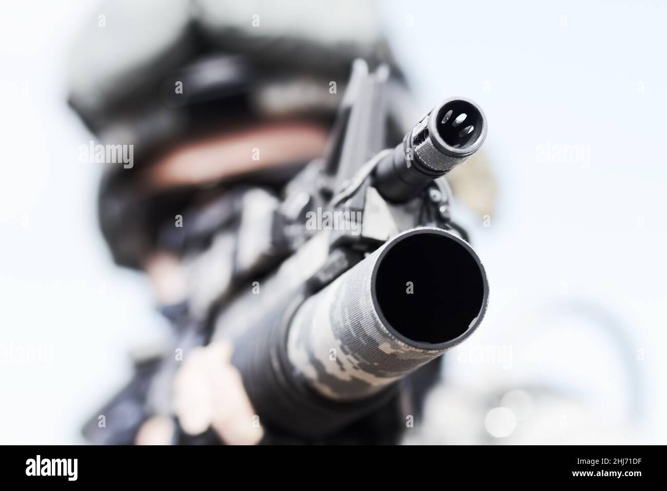 War weaponry. Closeup selective focus of the barrel of a gun. Stock Photo