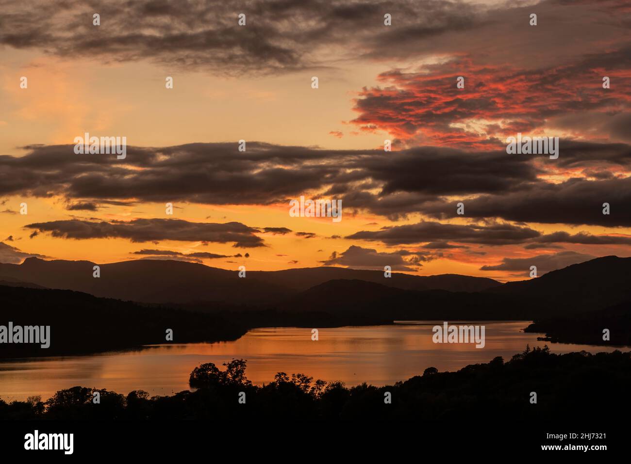 Looking North over Windermere from Biskey Howe at sunset Stock Photo