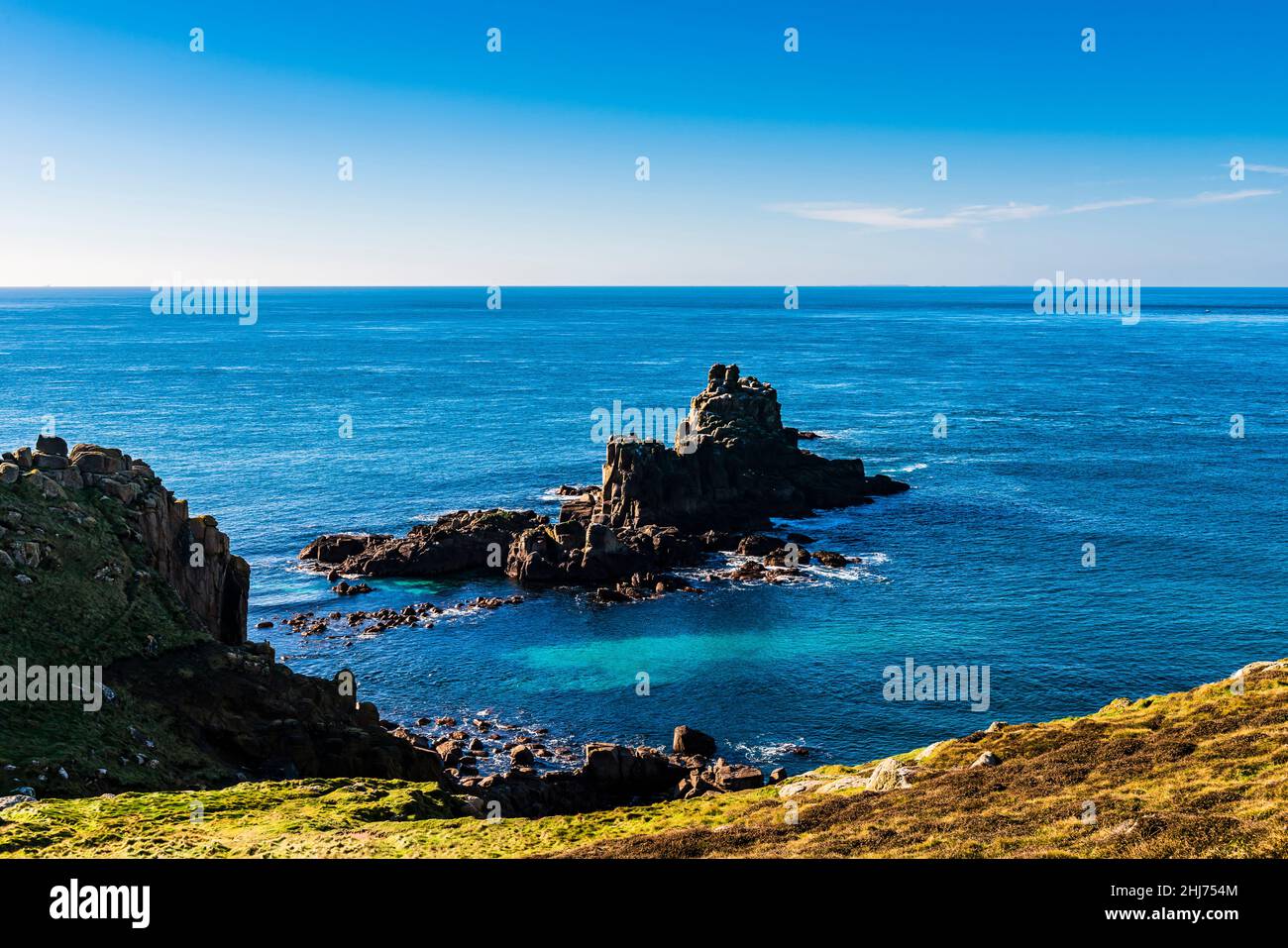 The Armed Knight rock, just off Land's End, Cornwall, UK Stock Photo