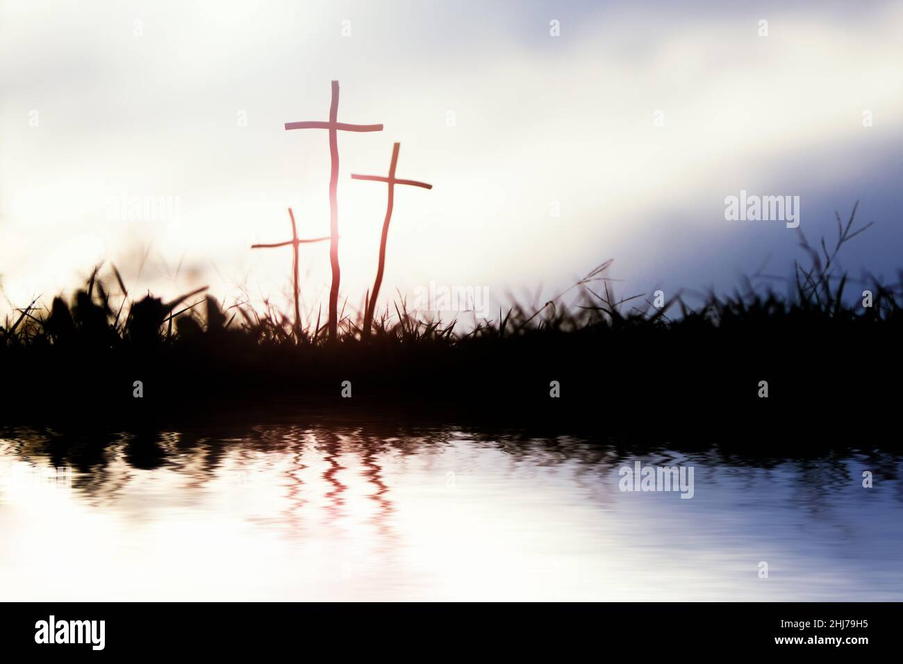 The holy cross of Jesus Christ by the calm waters and waves and space for text on a light background Stock Photo