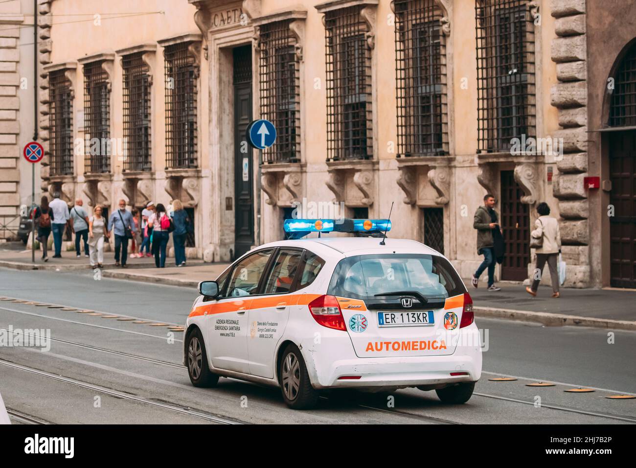 Rome Italy Moving With Siren Emergency Ambulance Small Honda Car On Street Emergency Lights System Els Activated Stock Photo Alamy