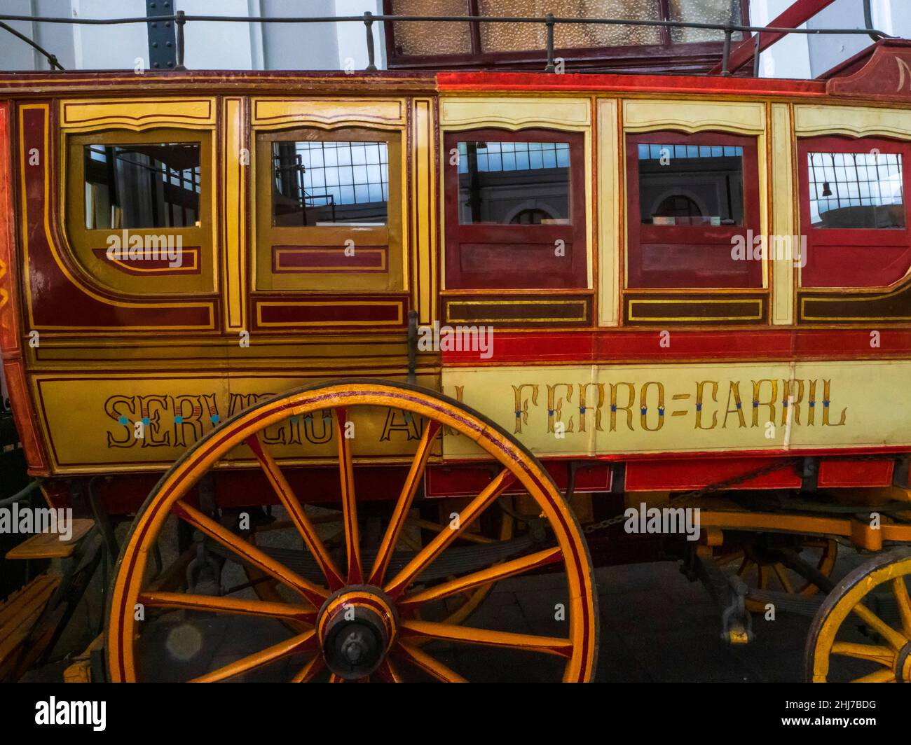 Old wooden railway carriage with wheels Stock Photo