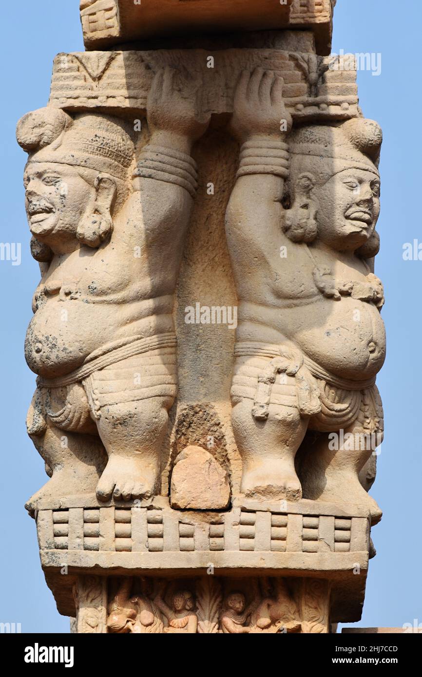 Stupa No 1, West Gateway, Dwarfs upholding both the Pillars. World Heritage Site, Sanchi, Madhya Pradesh, India Stock Photo