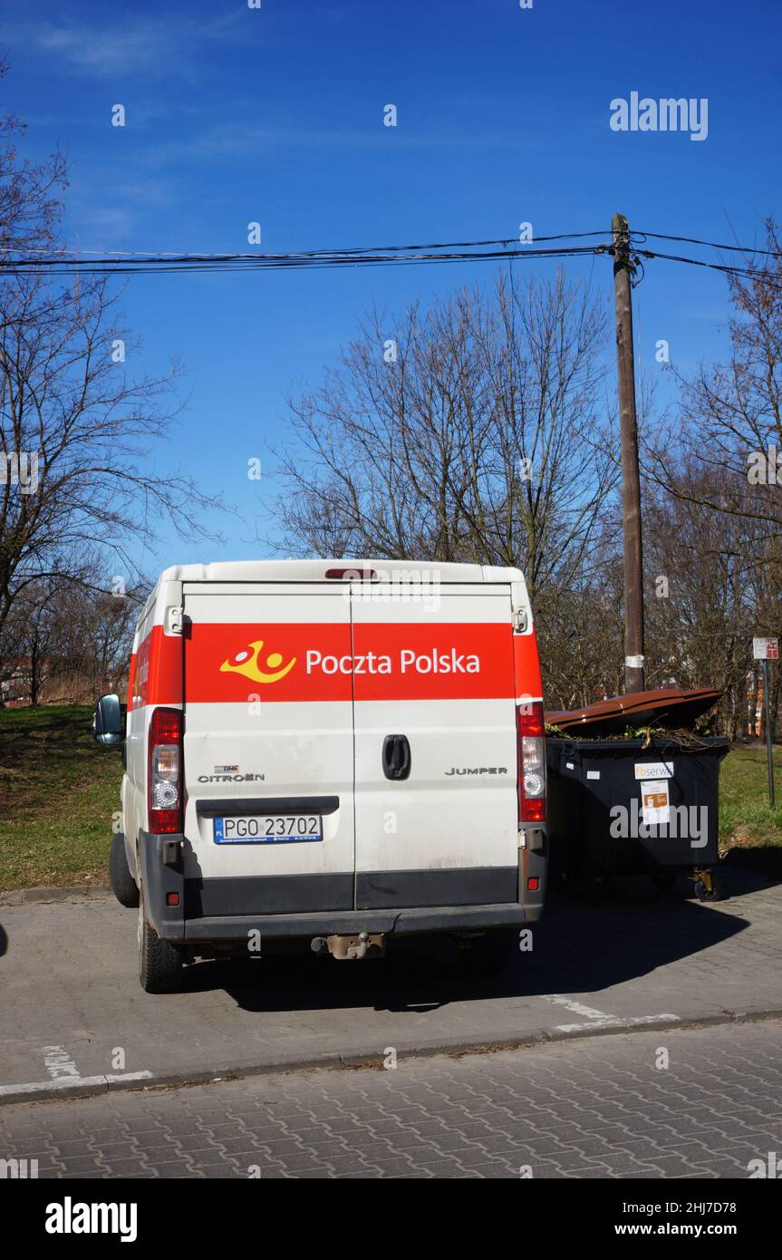 Parked Poczta Polska company van in the Stare Zegrze district in Poland Stock Photo