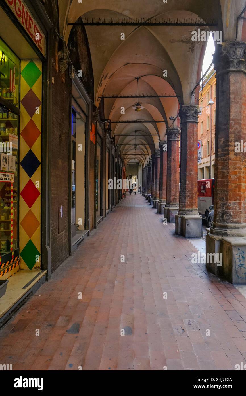 Bologna, Italy: One of the galleries in the old town of the city ...
