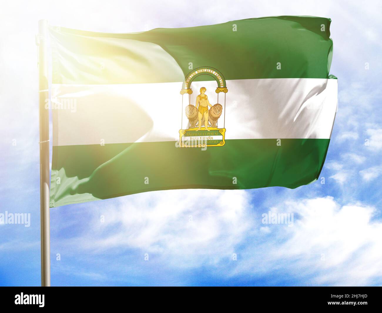 Flagpole with flag of Andalusia Stock Photo