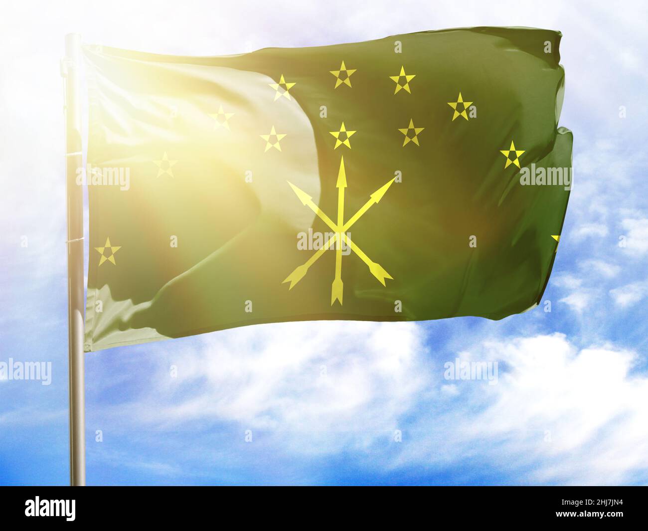 Flagpole with flag of Adygea. Stock Photo