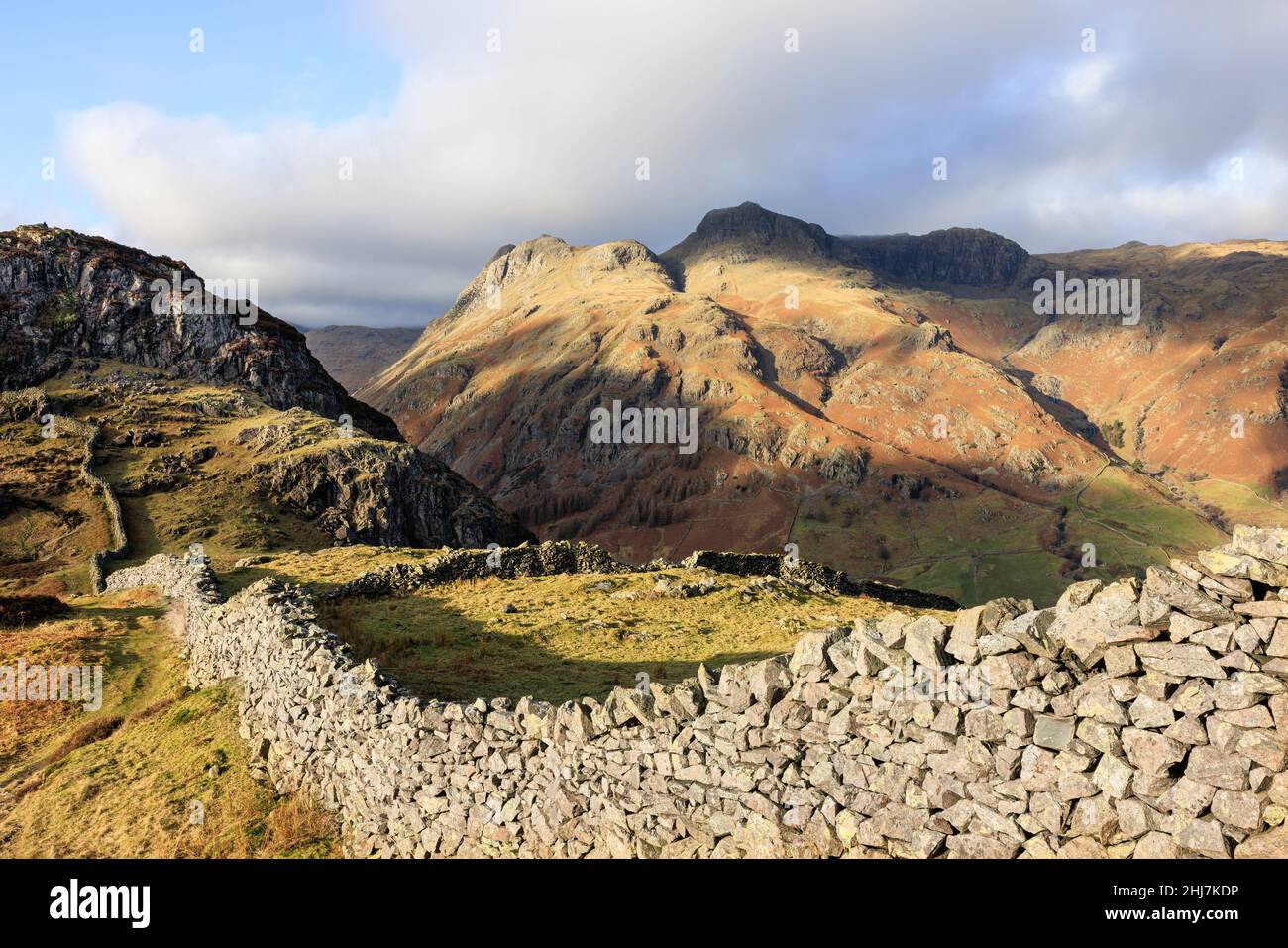 Views along the wall on Lingmoor, looking west towards the Langdale Fells Stock Photo