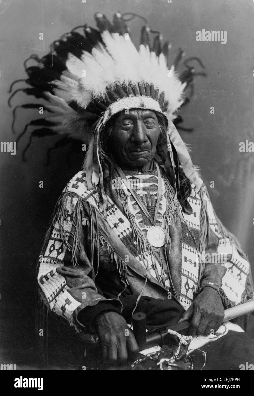 Chief Red Cloud portrait, seated; holding peace pipe - Antique and vintage photo - Native american / Indian / American Indian Stock Photo