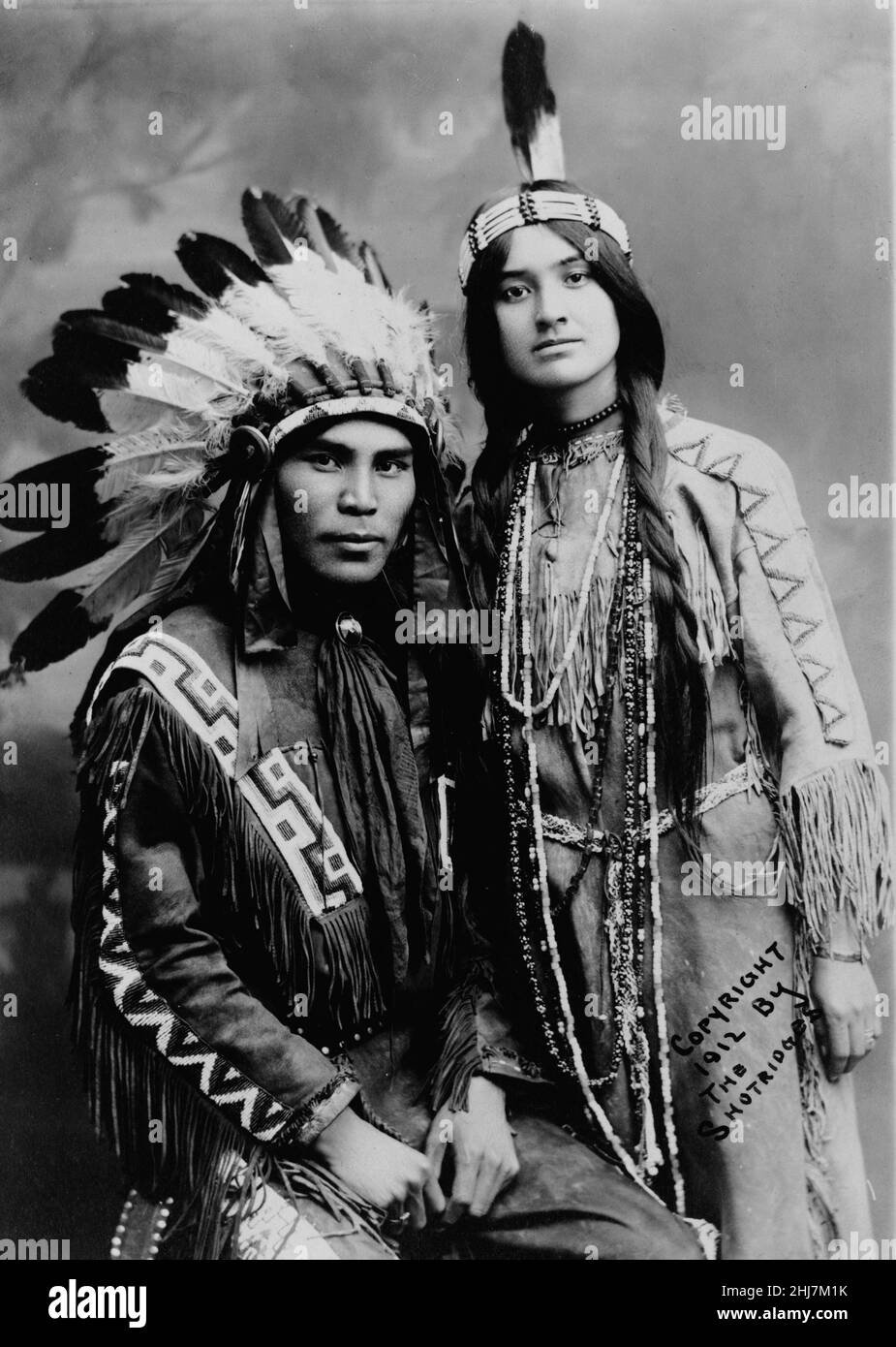 Situwuka & Katkwachsnea. Circa 1912 - Antique and vintage photo - Native american / Indian / American Indian. Photo by Shotridges. Stock Photo