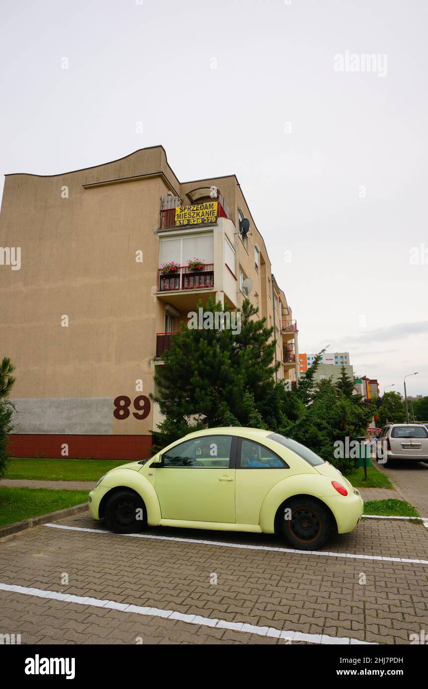 Parked Volkswagen Beetle in front of an apartment building Stock Photo ...