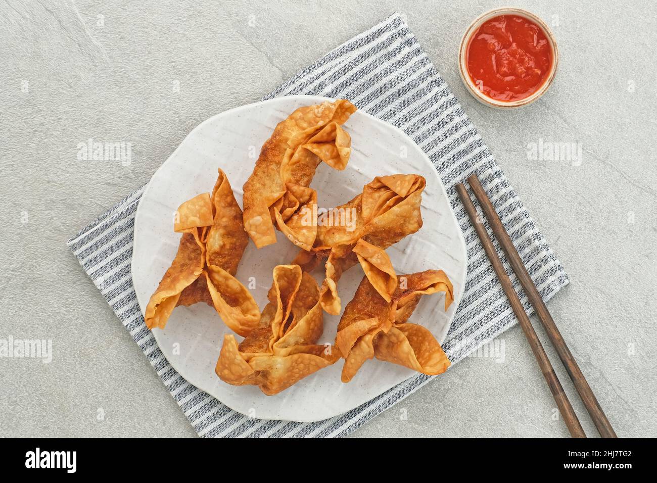 Pangsit, Pangsit Goreng, Delicious Pangsit Ayam Goreng (Chicken Fried Dumpling), Indonesian Traditional Food made from flour and chicken. Stock Photo