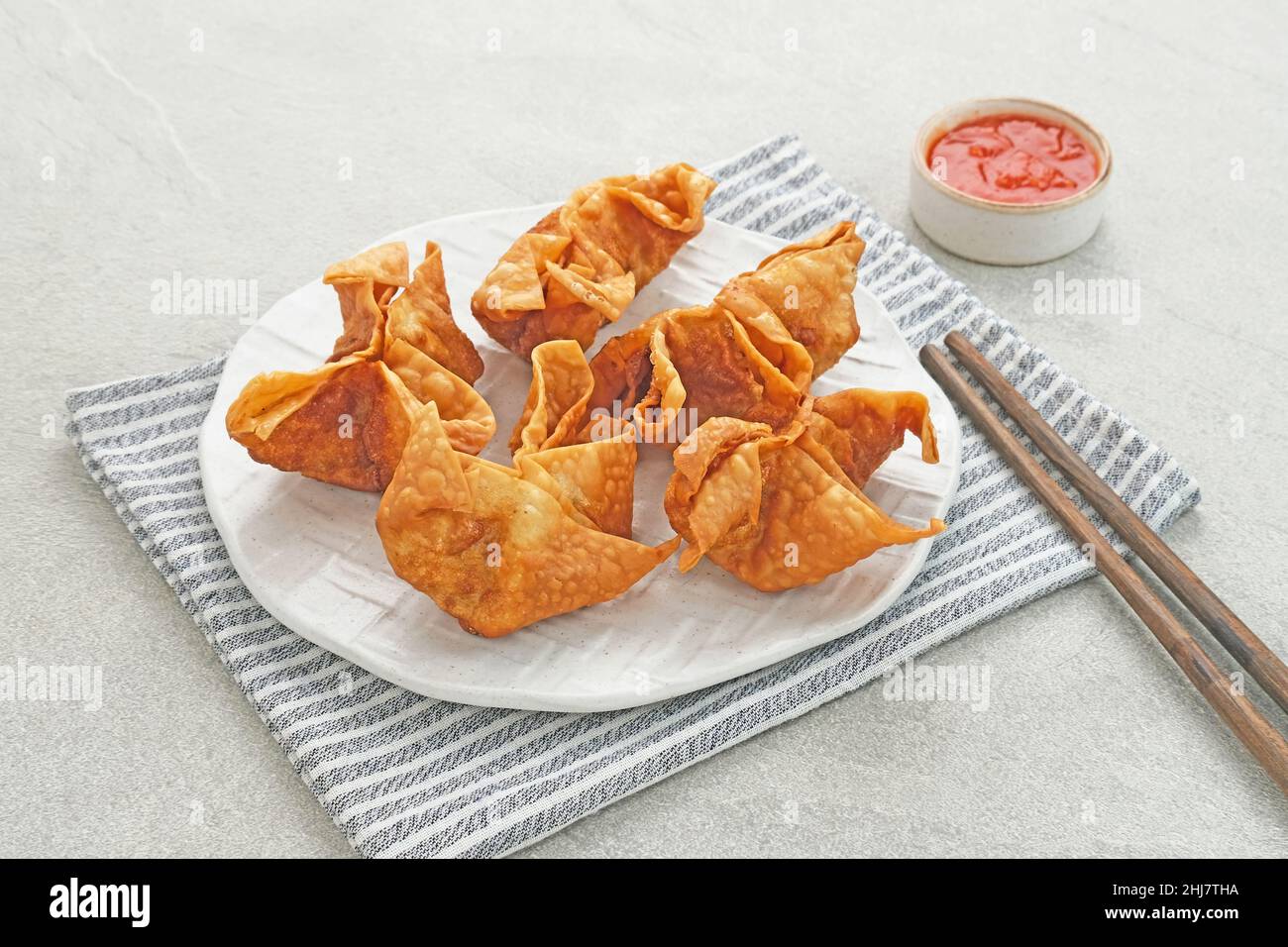 Pangsit, Pangsit Goreng, Delicious Pangsit Ayam Goreng (Chicken Fried Dumpling), Indonesian Traditional Food made from flour and chicken. Stock Photo