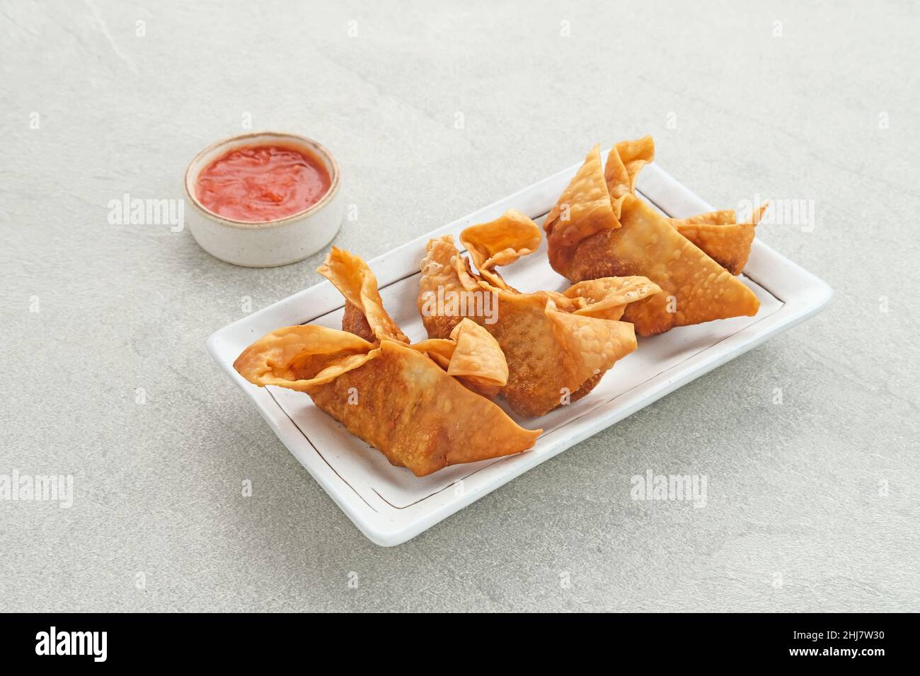 Pangsit, Pangsit Goreng, Delicious Pangsit Ayam Goreng (Chicken Fried Dumpling), Indonesian Traditional Food made from flour and chicken. Stock Photo