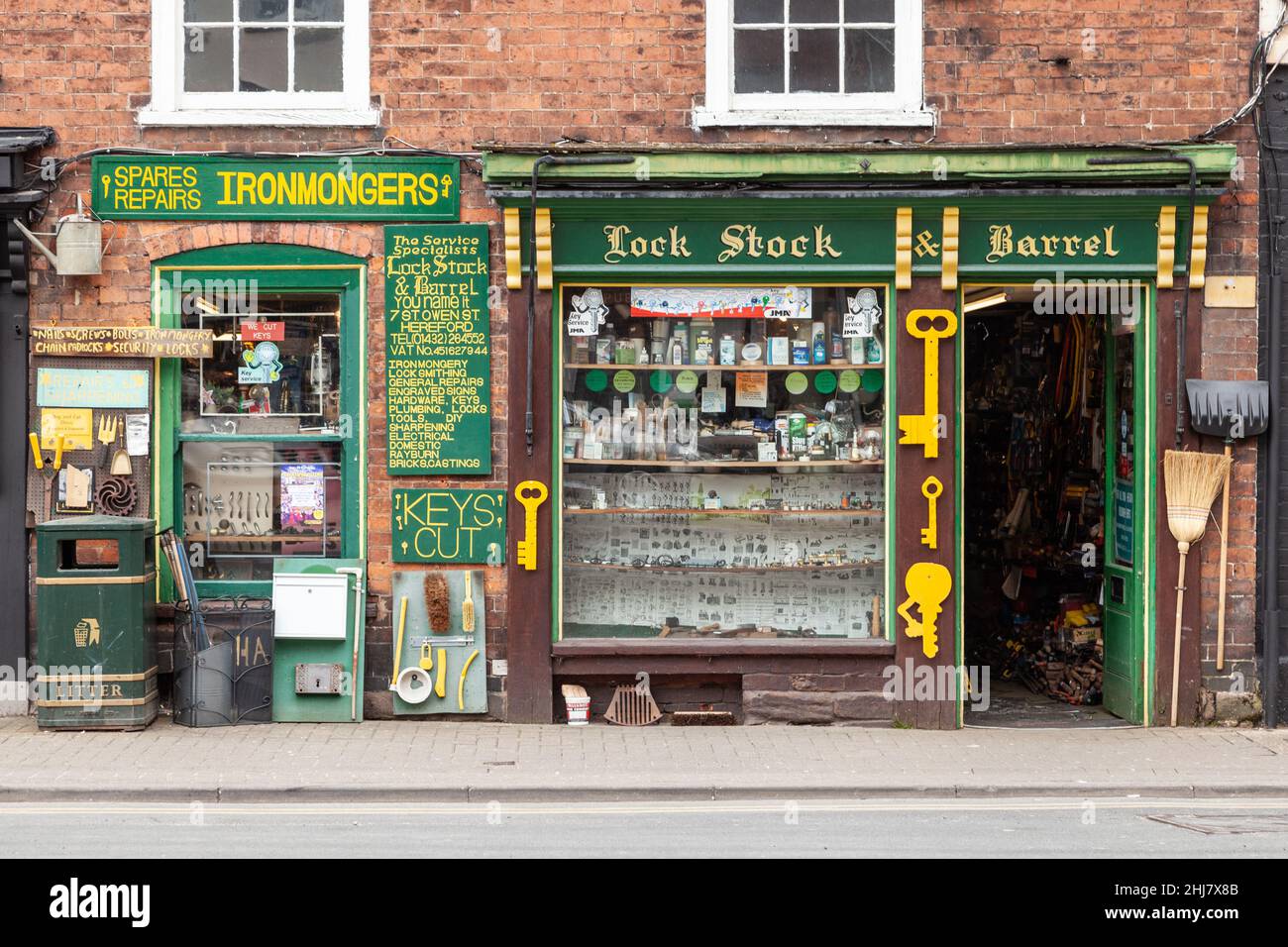 Ironmongers shop front with street display of ironmongery products Stock Photo