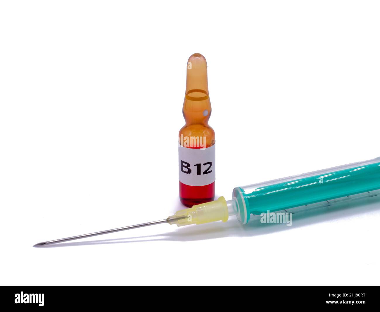 B12 vial with syringe isolated on white background Stock Photo