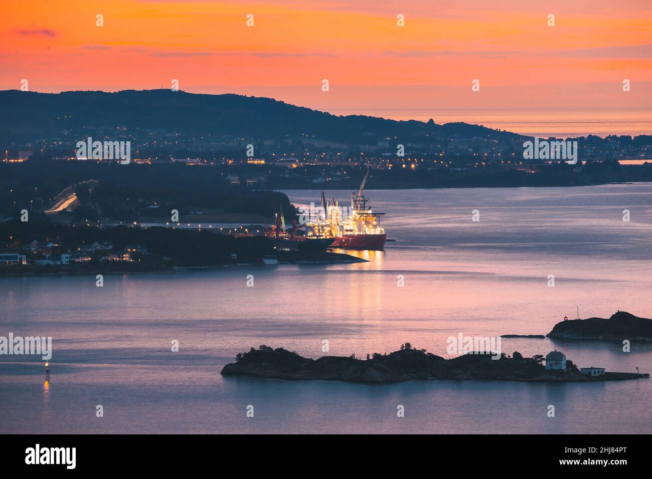 Alesund, Norway. Night View Of Moored Ship In Alesund Island. Summer Morning. Stock Photo