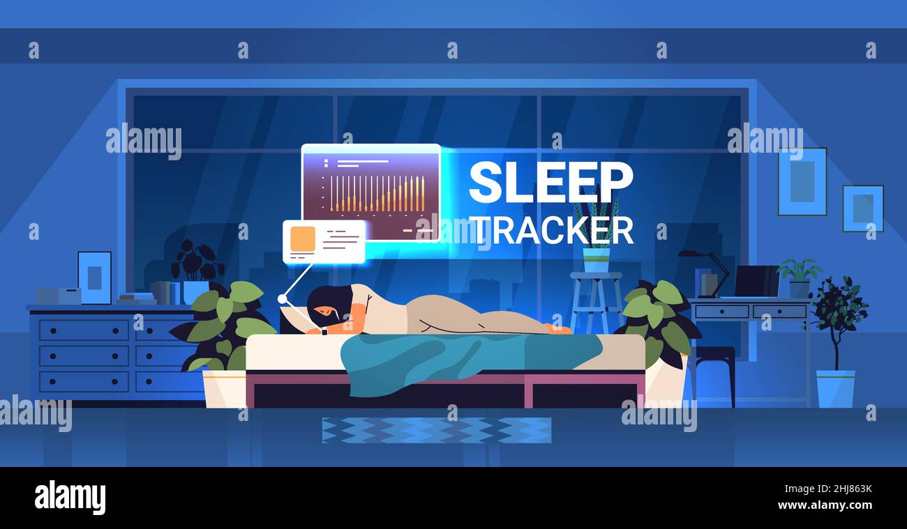 young woman sleeping in bed with electronic smart watch app tracker on
