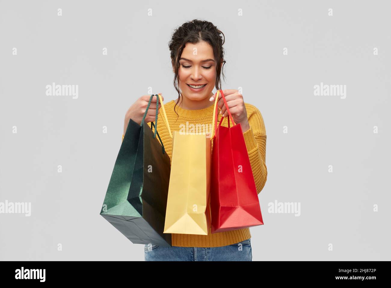 happy smiling young woman with shopping bags Stock Photo