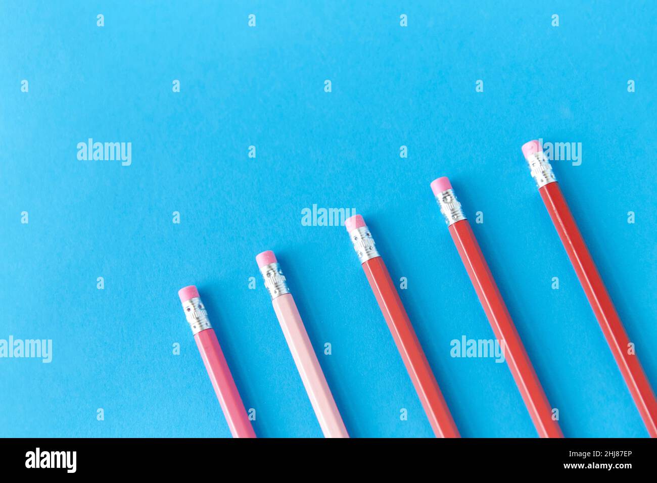 five lead pencils with eraser on tips Stock Photo